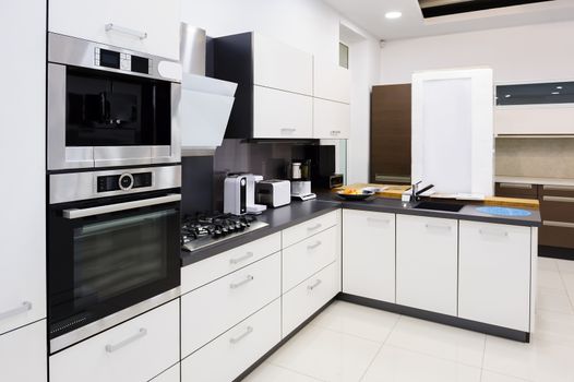 Modern luxury hi-tek black and white kitchen interior, clean design