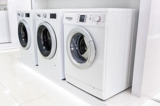 Washing machines, dryer and other domestic appliance equipment in the store