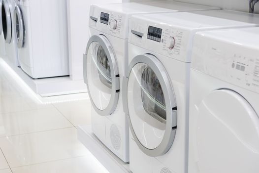 laudry dryers, washing machines and other domestic appliance equipment in the store