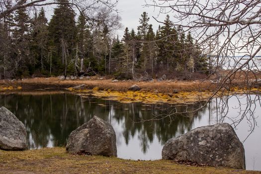 A calm day at the canadian south shore and reflections