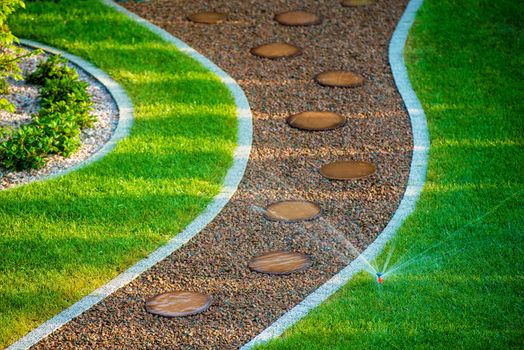 Backyard Lawn Automatic Sprinkler. Backyard Watering.