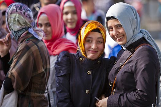 ISTANBUL, TURKEY – APRIL 27: Unidentified young women in light rain on the Hippodrome in Istanbul prior to Anzac Day on April 27, 2012 in Istanbul, Turkey. 