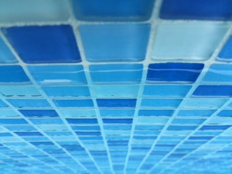 Mosaic tiles blue pattern of swimming pool