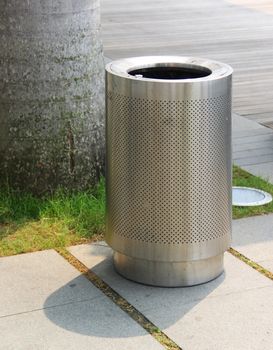 Garbage bin of steel stainless on park