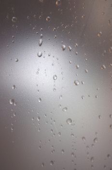 Water drops on matt glass background