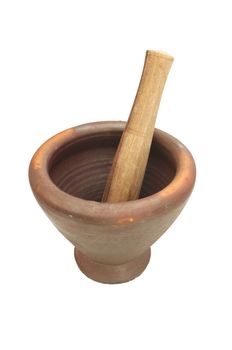 Clay mortar and wooden pestle isolated on white background