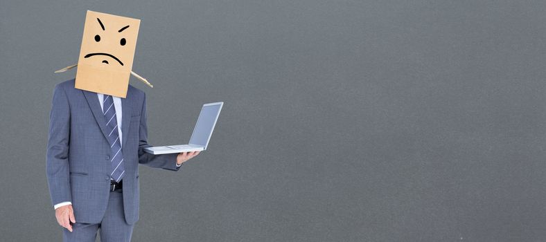 Anonymous businessman against grey background