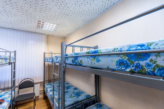 bunk metal beds in clean hostel room