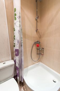 combined bathroom with sink toilet and shower tray