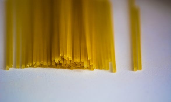 detail of raw spaghetti ready to be cooked