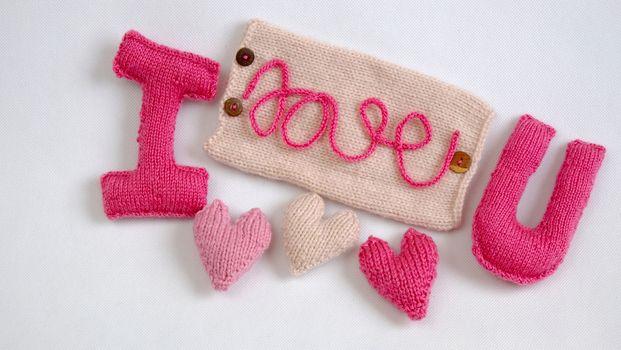 Amazing valentine background in pink colour, symbol of heart, i love you message, rose flower, all gift make handmade, knit from yarn, Valentines day on feb 14 is romantic day for love