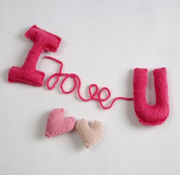 Amazing valentine background in pink colour, symbol of heart, i love you message, rose flower, all gift make handmade, knit from yarn, Valentines day on feb 14 is romantic day for love