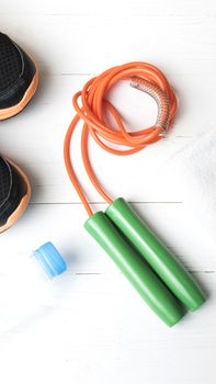 fitness equipment:running shoes,water bottle,towel,rope