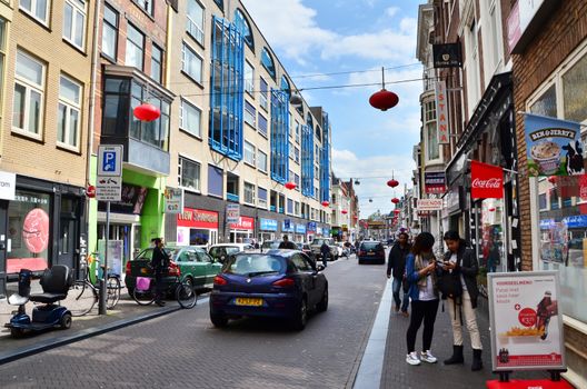 The Hague, Netherlands - May 8, 2015: People visit China town in The Hague on May 8, 2015. The Hague's Chinatown is located in the city centre, on the Wagenstraat.