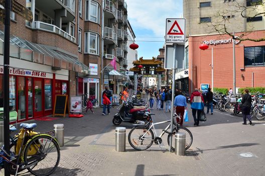 The Hague, Netherlands - May 8, 2015: People visit China town in The Hague on May 8, 2015. The Hague's Chinatown is located in the city centre, on the Wagenstraat.