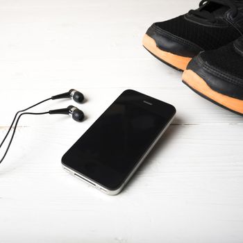 fitness equipment:running shoes,smartphone
