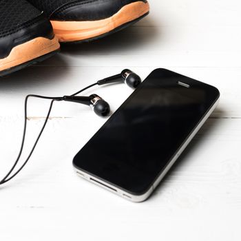 fitness equipment:running shoes,smartphone