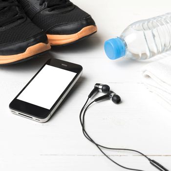 fitness equipment:running shoes,water bottle,towel,smart phone