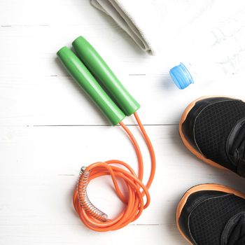 fitness equipment:running shoes,water bottle,towel,rope