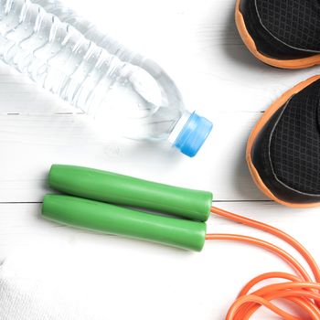 fitness equipment:running shoes,water bottle,towel,rope