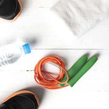 fitness equipment:running shoes,water bottle,towel,rope