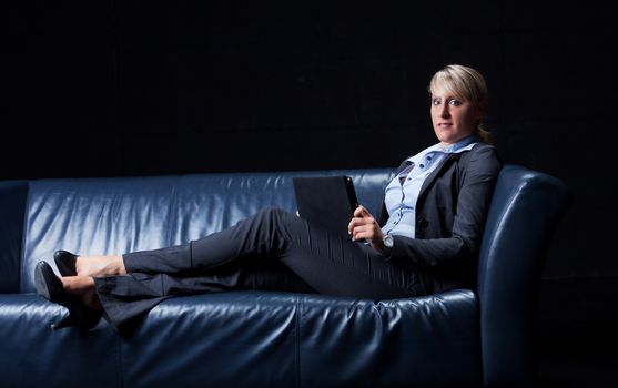 business woman on a couch