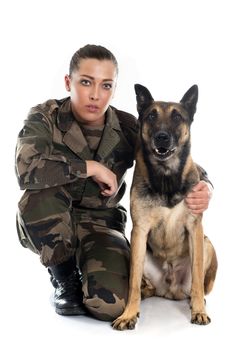 woman soldier and malinois in front of white background