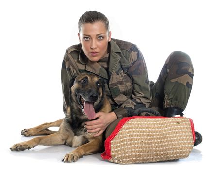 woman soldier and malinois in front of white background