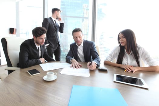 Business people working together at a meeting in modern office