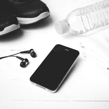 fitness eqiupment:running shoes,water bottle,towel,smart phone black and white color style