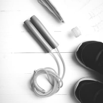 fitness equipment:running shoes,water bottle,towel,rope black and white color style