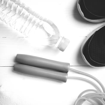 fitness equipment:running shoes,water bottle,towel,rope black and white color style
