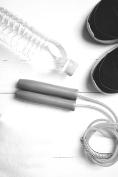 fitness equipment:running shoes,water bottle,towel,rope black and white color style