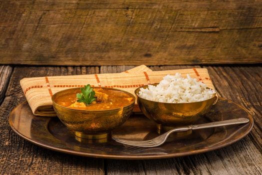 Chicken madras served with white basmati rice.