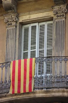Flag of Catalonia on the Balcony in Barcelona, Spain