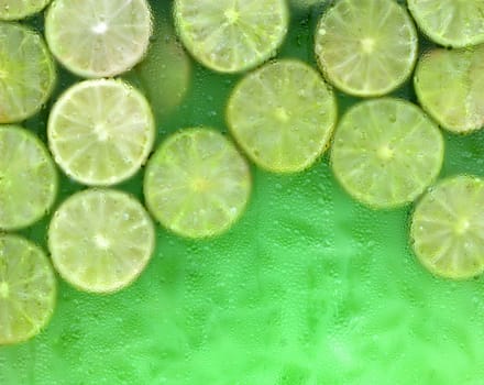 Fresh lemonade with green limes