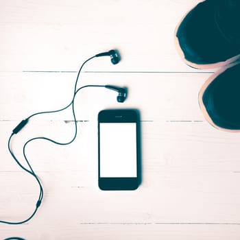 fitness equipment:running shoes,smartphone vintage style