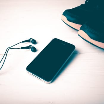 fitness equipment:running shoes,smartphone vintage style
