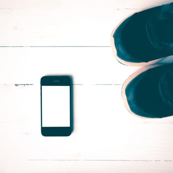 fitness equipment:running shoes,smartphone vintage style