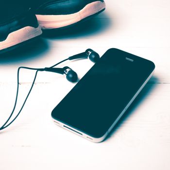 fitness equipment:running shoes,smartphone vintage style
