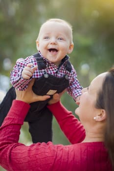 Cute Little Baby Boy Having Fun With Mommy Outdoors.