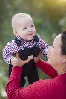 Cute Little Baby Boy Having Fun With Mommy Outdoors.