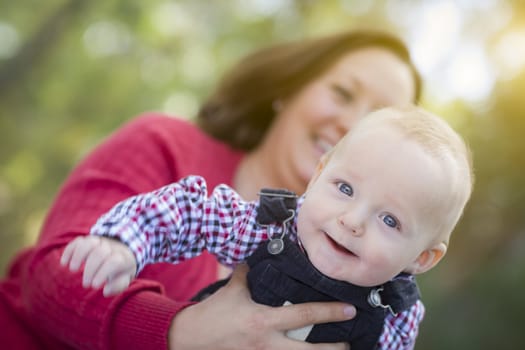 Cute Little Baby Boy Having Fun With Mommy Outdoors.