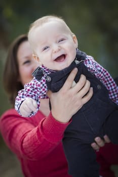 Cute Little Baby Boy Having Fun With Mommy Outdoors.