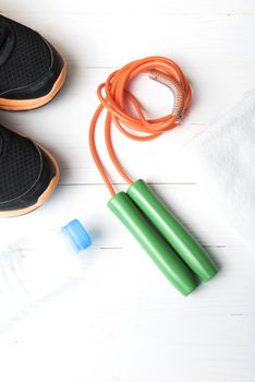 fitness equipment:running shoes,water bottle,towel,rope