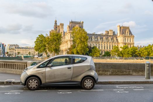 PARIS, FRANCE - CIRCA AUGUST 2015: An Autolib' is parked at an Autolib' station and charging point. Autolib' is an electric car sharing service.