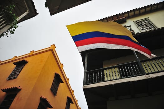 a big Colombia flag in balcony house