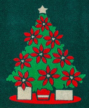 christmas tree carpet on green background