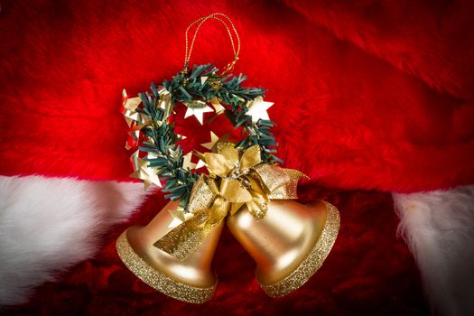 gold bells on Santa Claus hat  with dark vignette