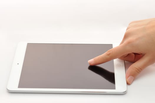 Finger touching tablet